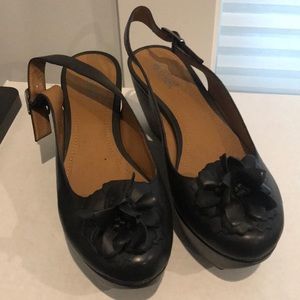 Kenneth Cole black flower wedge.